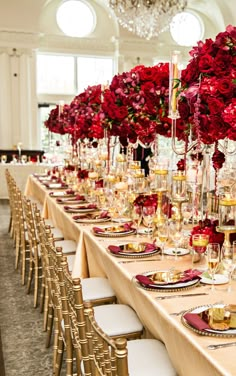 Luxury ballroom wedding reception with long gold tablescapes, tall centerpieces with red roses and flowers, and burgundy place settings | New Jersey Top Wedding Planner | Party Planner | Floral Design | JP Events And Design Wine Gold And White Wedding, Red And Gold Wedding Reception, Red And Gold Wedding Decor, Ruby Red Wedding Theme, Red Gold Table Setting, Red White And Gold Wedding Reception, Gold Red Wedding, Purple Red Gold Wedding, Deep Red And Gold Wedding