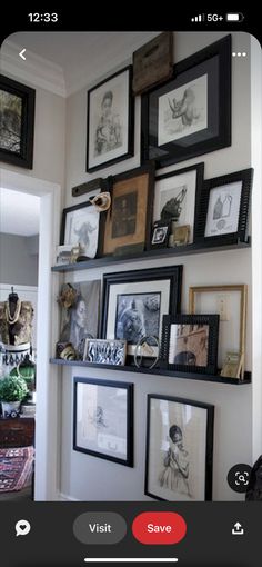 the wall is filled with many framed pictures and frames on it's sides, as well as an instagram button