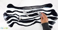 Make this super easy zebra slime for a preschool zoo theme (older kids would love it too)! Fun and simple sensory play for the kids. Zebra Sensory Bin, Zebra Crafts Preschool, Zebra Crafts For Preschoolers, Zebra Projects For Preschool, Build A Zebra Printable, Planning Ideas