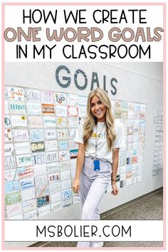 a woman standing in front of a bulletin board with the words how we create one word goals in my classroom