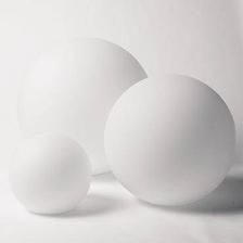 three white eggs sitting next to each other