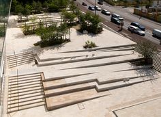 an aerial view of a parking lot with stairs