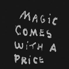 the words magic comes with a price written in white chalk