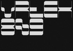 some type of text that is white and black with the letters in different font styles