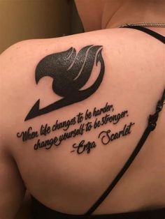 the back of a woman's shoulder with an arrow and quote written on it