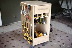 a tool cabinet with tools in it on the floor