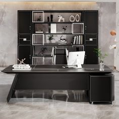 an office with black desks and shelves on the wall