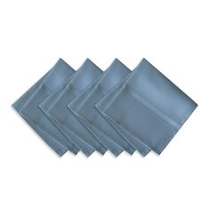 four blue napkins sitting on top of each other