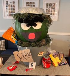 a potted plant has been decorated to look like oscar the grouch