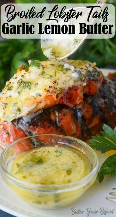 grilled lobster tails with garlic lemon butter on a white plate and garnished with parsley