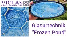 there is a blue glass plate with the words glasurtechnik frozen pond on it