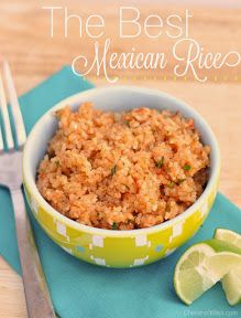 the best mexican rice recipe in a bowl with limes and a fork next to it