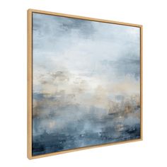 an abstract painting with blue and gold colors on the wall, it is framed in wood