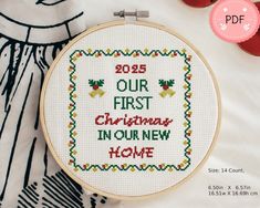 a cross stitch pattern with the words, 2013 our first christmas in our new home