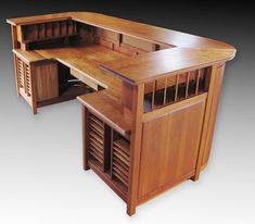 an office desk with two drawers and a shelf on the top is made out of wood