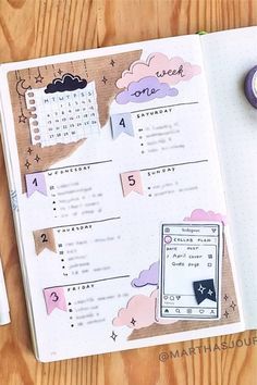 an open planner with some stickers on it