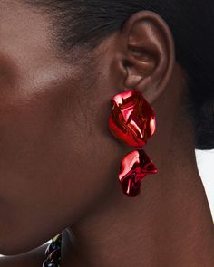 The Fold Earrings are sculptural drop earrings in a metallic red ceramic finish. Why We Love It Their intricate folds are highlighted by the high-polished Mirror Finish and vibrant color. Details Ceramic plated High-polish Mirror Finish Butterfly fastening for pierced ears Item includes suede jewelry pouch and box Handcrafted in New York City Shipping Ships within 1-2 working days. More Options The Fold Earrings are also available in Sterling Silver. Helmet Ring, Suede Jewelry, Red Ceramic, Gold Vermeil Jewelry, Choker Pendant, The Fold, Everyday Necklace, Vermeil Jewelry, Colorful Earrings