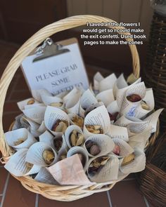 a basket filled with lots of different types of paper