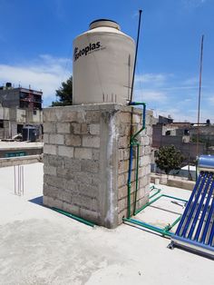 a water heater sitting on top of a building