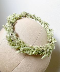 "This dainty little crown was handmade using wild meadow grasses and sized just right for your tiny prince or princess. Charmingly simplistic, its feather-like greenery adds an enchanting touch to newborn or first birthday photos.  For an adult sized flower crown, visit the following listing: https://www.etsy.com/listing/1029009088 SIZE: This circular crown measures about 5.75 x 5.75\" with an inner diameter of about 4.25 inches. The circumference of the crown is about 14\" around. ALL MATERIALS: Wired Hemp Wild Canary Grass Brass Wire CARE: This piece is very fragile and is intended for use as a photography prop or for decoration. If stored away from excessive light and moisture, the crown will last indefinitely! While I have taken care to tuck all wire ends safely into the crown, please Crown Baby Boy, Boy Crown, Grass Wreath, Baby Wreath, Crown Baby, Prince Crown, Baby Prince, First Birthday Photos, Flower Crowns