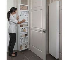 a woman is opening the door to an open refrigerator