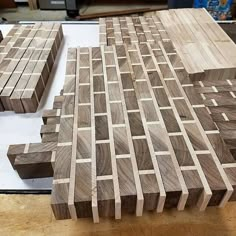 several pieces of wood sitting on top of a table