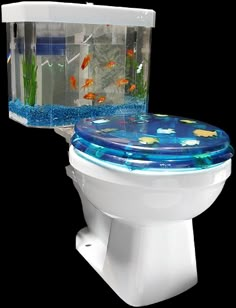 an image of a toilet with fish in the tank on it's back side