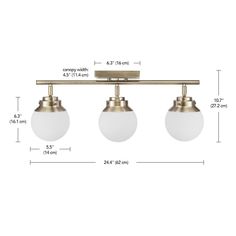 three light brass finish track fixture with white glass globes and an adjustable metal bar