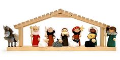 a nativity scene with figurines of people and animals