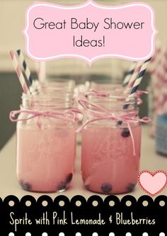 two mason jars with straws and blueberries in them are sitting on a counter