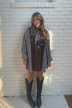 Reworked Country & Proud Tshirt with flannel sleeves  One size fits most. Can fit XS-XL depending on desired fit.   One of a kind!!   Model is 5'5", typically small in tops DETAILS & CARE: MACHINE WASH GENTLE HANG DRY Fall T Shirt Dress Outfit, Tshirt Country Concert Outfit, Fall Outdoor Country Concert Outfit, Western Fashion Inspo Outfits, Emo Country Outfits, Country Show Outfits, Winter Zach Bryan Concert Outfit, Rock Country Concert Outfit, Flannel With Dress