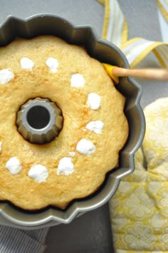 a cake in a pan with the words twinkie poke cake on it's side