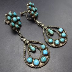 OLD PAWN SNAKE EYE TURQUOISE PETIT POINT STERLING SILVER EARRINGS DESCRIPTION:  These exquisite earrings will be a cherished addition to your collection of quality vintage Southwestern and Native American jewelry. Earrings measure 2 3/8" x 7/8" WEIGHT: 14.8 grams SIGNED: no STERLING:  yes, stamped STERLING Snake Eyes, American Jewelry, Screw Back Earrings, Native American Jewelry, Sterling Silber, Sterling Silver Earrings, Native American, Silver Earrings, Jewelry Earrings