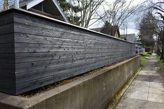 the side of a house that is made out of wood