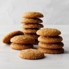 a stack of cookies sitting next to each other on top of a white countertop