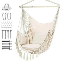 a white hammock hanging chair with accessories