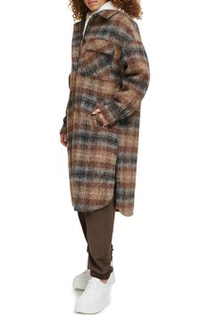 A shirt-inspired coat features a warm, wool-like design, while an allover plaid print and longline silhouette add to the laid-back charm. 44" length (size Medium) Point collar Lined, with polyester fill 89% polyester, 8% acrylic, 2% wool, 1% other fibers Machine wash, tumble dry Imported Wool Coats For Women, Long Jackets For Women, Longline Coat, Brown Plaid, Levis Women, Plaid Flannel Shirt, Fall Fashion Trends, Sherpa Lined, Plaid Print