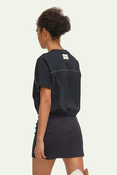 Made from a lightweight and breathable fabric, the YPL Drawstring Short Sleeve ensures maximum air circulation. The drawstring design at the waist offers a custom fit for your body shape. Show off your unique style with the iconic YPL logo printed on the front. Athleisure Tops With Drawstring For Workout, Sporty Stretch Tops With Drawstring, Athleisure Workout Top With Drawstring, Stretch Drawstring Tops For Streetwear, Sporty Black Tops With Drawstring, Stretch Drawstring Sports Tops, Nylon Drawstring Sportswear Activewear, Fitted Drawstring Top For Streetwear, Drawstring Sportswear Tops