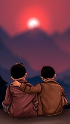 two children sitting on the ground watching the sun go down in the sky with mountains behind them