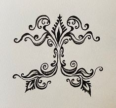 an intricately designed design on white paper