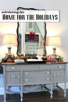 an old dresser with christmas decorations on top and the words entertaining tips home for the holidays above it