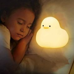 Children Sleep With Cute Night Light Silicone Charging Dimming Bedside Lamp Features: Children sleep with cute night light silicone charging dimming bedside lamp Features: Features: warm light care, that is, light, sleep with of mind, lasting battery life, adjustable brightness. Appearance: Cute shape, soft waxy Q projectile, the whole body is white texture. Usage: Short press the mouth - turn on and off the light, long press the mouth - adjust the brightness, double click the 's mouth - delay 15 minutes to turn off the light. Applicable crowd: Astigmatism 3000k warm light, not cures the atmosphere, but also protects the children who are afraid of the dark. Application scenario: three blocks of soft light, get up at night, sleep with, warm, full time care. Product Description: Contains a s Cheap Ornaments, Cute Night Lights, Clear Ornaments, Cute Shape, Afraid Of The Dark, Thanksgiving Table Decorations, Wooden Christmas Ornaments, Indoor Christmas Decorations, Night Sleep