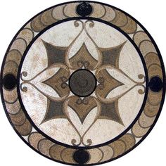 a circular glass table top with an intricate design on the center and sides, in various colors