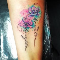 a woman's leg with flowers on it and the words happy birthday written in cursive writing