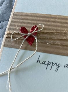 a close up of a greeting card with a heart on it