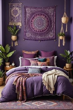 a bedroom with purple walls and lots of pillows