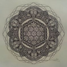 a drawing of a flower of life in black and white