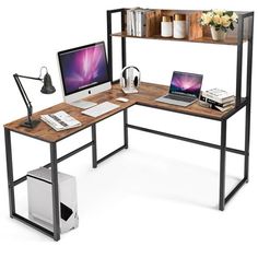 a computer desk with a laptop and monitor on it