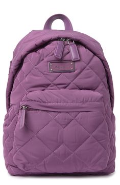 Quilted construction adds a luxe feel to this nylon backpack.- Single top handle- Adjustable shoulder straps- Two-way zip top closure- Exterior features 1 zip pocket- Interior features 1 zip pocket- Perfect for school backpack or bookbag- Approx. 14" H x 14" W x 7" D- Approx. 3" handle drop, 6-12" strap drop- Imported Nylon exterior and lining Functional Purple Nylon Backpack, Purple Nylon Backpack, Rectangular Purple Nylon Backpack, Functional Purple Backpack With Zipper Closure, Purple Backpack With Zipper Closure For On-the-go, Quilted Backpack, Women Leather Backpack, School Backpacks, Leather Backpack