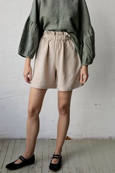 "Shorts are made from 100% soft and washed medium weight linen. Details: - Colour: Sand - Composition: 100% Oeko-Tex certified linen - High waist - Over the knee - Elastic waist - Medium weight linen - Linen care: machine wash gentle; tumble dry low, ironing optional - The price is for one pair of shorts, other pictured items are not included The model is 170 cm/5'7\" and wears a size XS." Flowy Shorts, Skorts, Linen Short, Elastic Waist Shorts, Linen Shorts, Over The Knee, High Waisted Shorts, Short Outfits, Elastic Waist